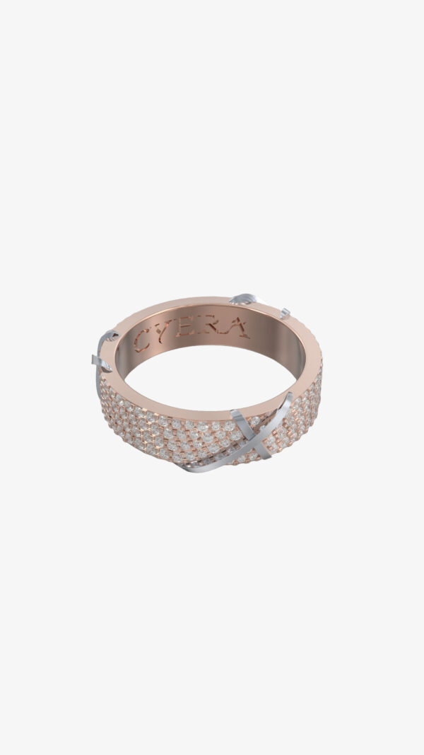 Elegant Apex Collection rings with diamond line, yellow gold arrow, and ribbon-crossing diamond pattern, showcasing refined craftsmanship.