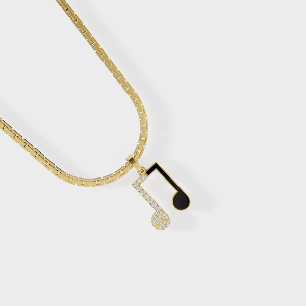 Minimalist gold music note pendant with diamonds and black enamel, blending elegance and hip-hop style.