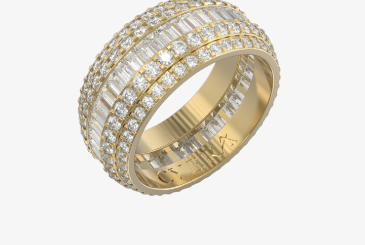 a gold ring with diamonds